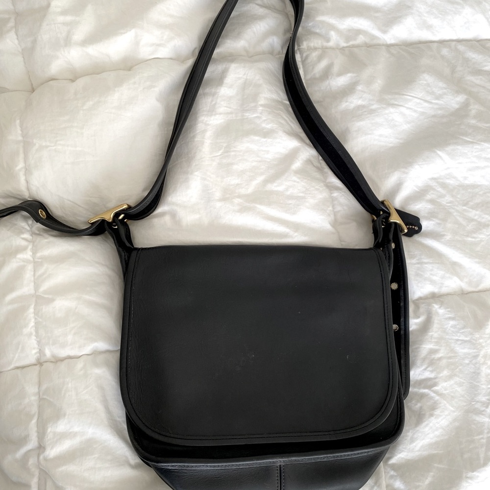 Vintage black leather saddle bag with gold